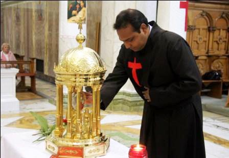 friar praying to heart