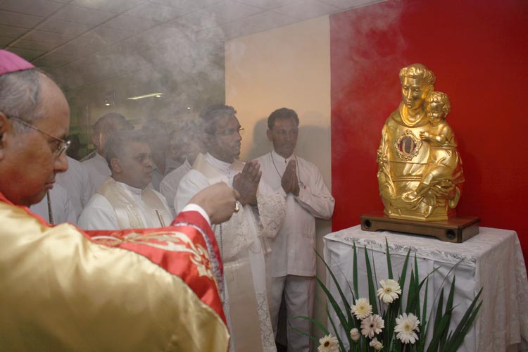 incense to statute with tongue