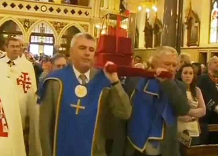 parading holy head in church