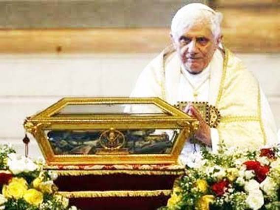 pope praying to bones